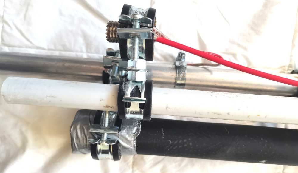 Mounting detail for tower to tube and fishing rod connection.