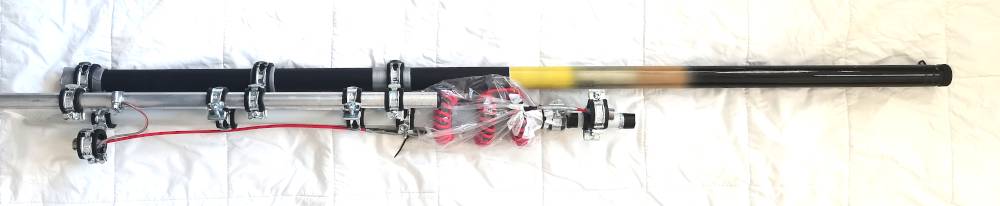 Broadband RF choke with fishing rod, plastic tube and aluminum telescope tower.